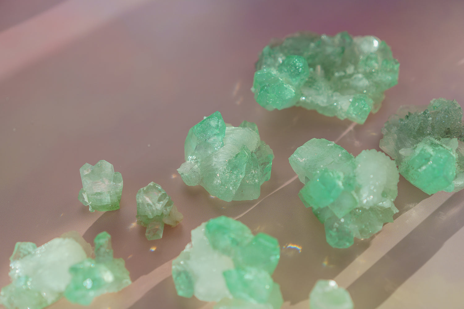 natural green apophyllite with white stilbite crystal mineral glowing in the evening sun